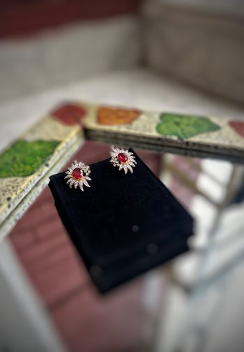 Pure silver earring with diamond and big ruby in the middle