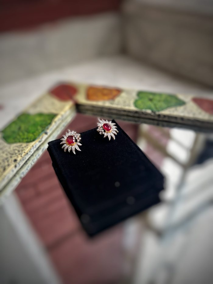 Pure silver earring with diamond and big ruby in the middle