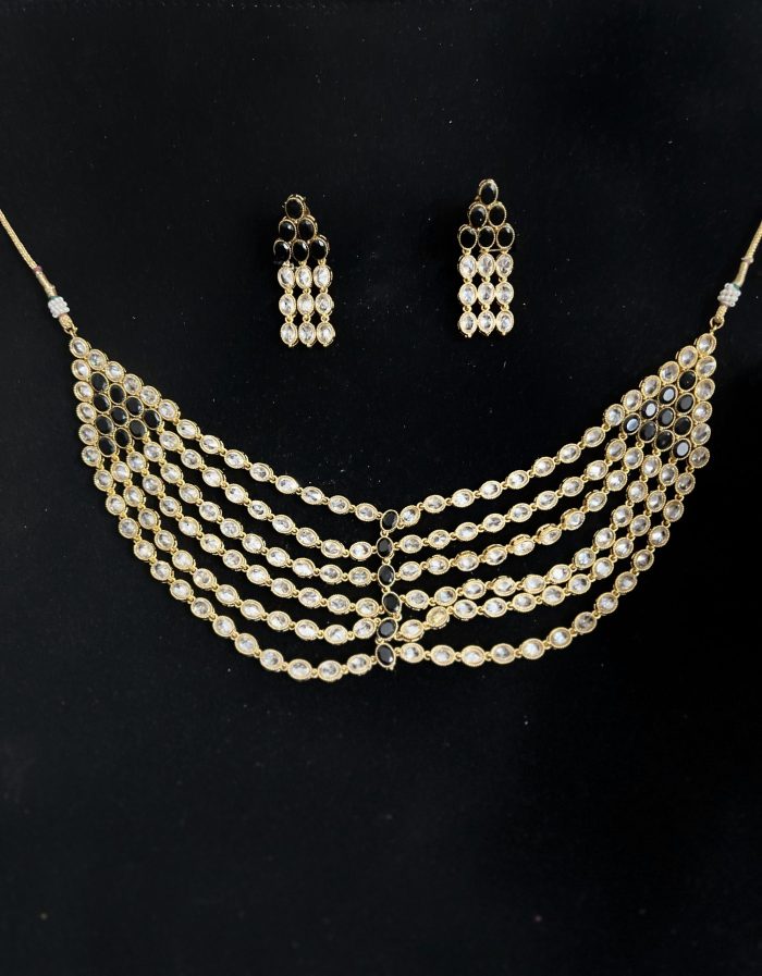 White and Black Kundan set. Six layer with matching earrings