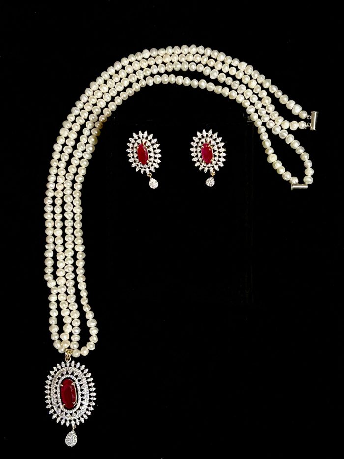 2 string real pearl with ruby and diamond pendant with matching earrings