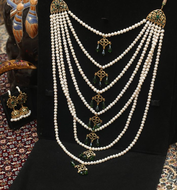 7 layer pearl set with green stones and real pearl comes with jhumka