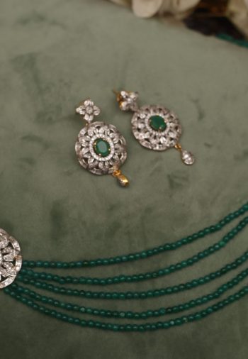 Emerald strings with matching earrings and two pendants